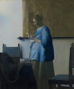 زنی با لباس آبی نامه می خواند اثری از یوهانس ورمیر